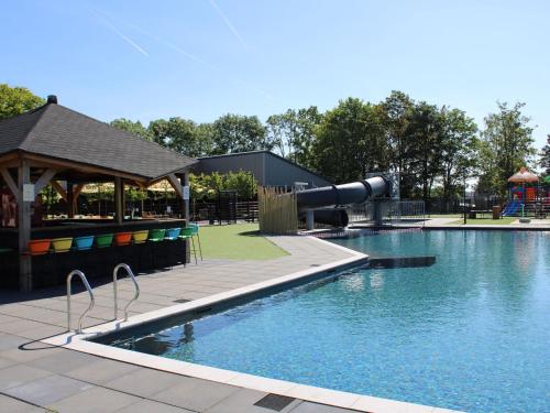 Modern chalet with a dishwasher, in a holiday park at a recreational lake