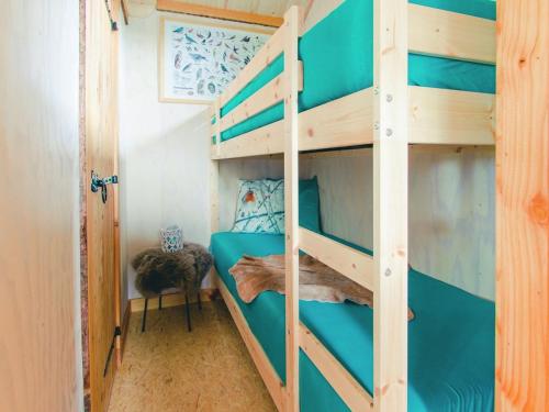  Charming cottage with terrace, in a holiday park on the river De Regge in Zuna