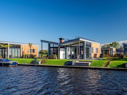  Beautiful chalet with a jetty, near Frisian lakes in Akkrum