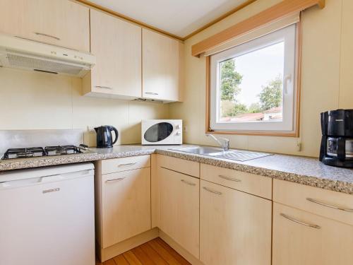 Chalet in Leukermeer by the Waterside in Well