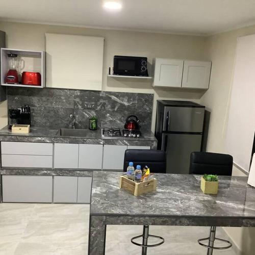 Instalaciones, Cozy 1-bedroom apartment minutes away drive to Mangel Halto Beach in Savaneta