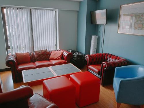 ห้องส่วนกลางสำหรับนั่งเล่น/ดูทีวี, เบลฟาสต์ อินเตอร์เนชั่นแนล ยูธ โฮสเทล (Belfast International Youth Hostel) near มหาวิทยาลัยควีนส์