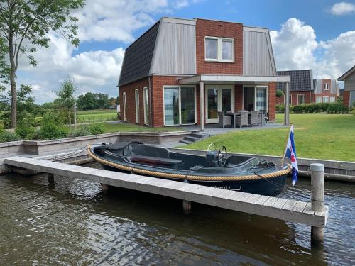  Holiday Home with private jetty on water in Akkrum