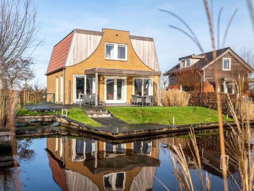  Holiday Home with private jetty on water in Akkrum