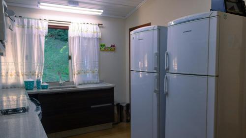 Casa com lareira e lazer, em Campos do Jordao SP