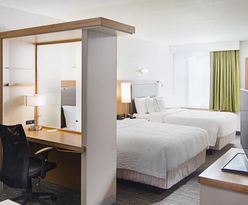 Studio with Two Queen Beds and One Sofa Bed
