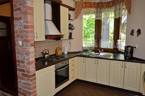 Domek Letniskowy Leśna Chata - image 6