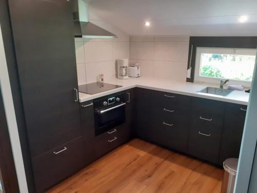 Зручності, Bungalow/vakantiehuis op park Bavelds Dennen in Денекамп