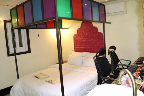 HOTEL  MARIGOLD Room Type - Family Room