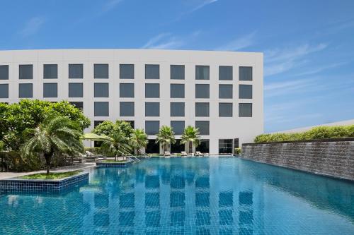 Swimming pool, Novotel New Delhi International Airport - An Accor Hotels Brand in Indira Gandhi Int'l Airport
