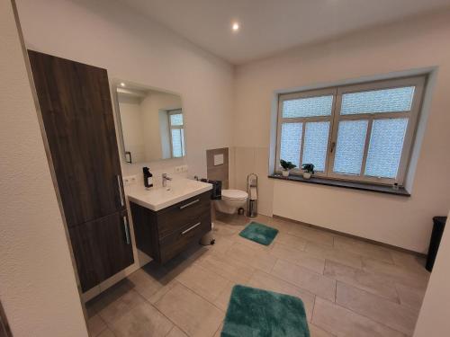 浴室, Ferienwohnung an der Eiswiese in 埃伯恩