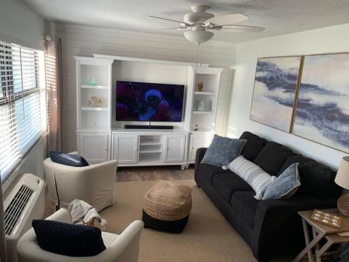 Coastal Waters Retreat 115 - A 1st Floor Beautiful Remodeled Ocean View Condo in New Smyrna Beach, USA