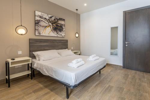 Studio 42 with kitchenette at the new Olo living - Chambre d'hôtes - Paceville
