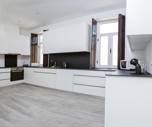 Kitchen, OLOPO Hostel in Campana