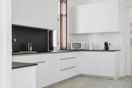 Kitchen, OLOPO Hostel in Campana