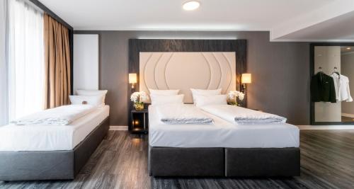 Premium Triple Room room in PLAZA Premium Heidelberg