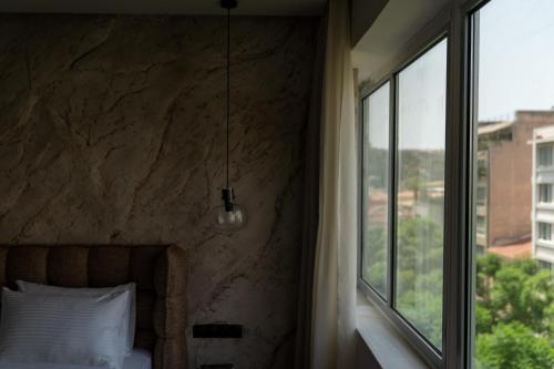 Athens Design Suites - Tap to explore photos