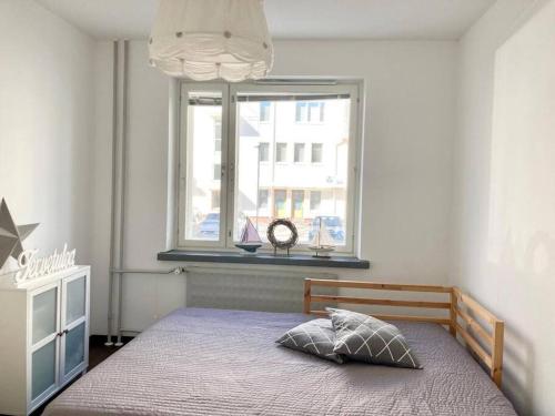 Tilava ydinkeskustakaksio ilmaisella autopaikalla