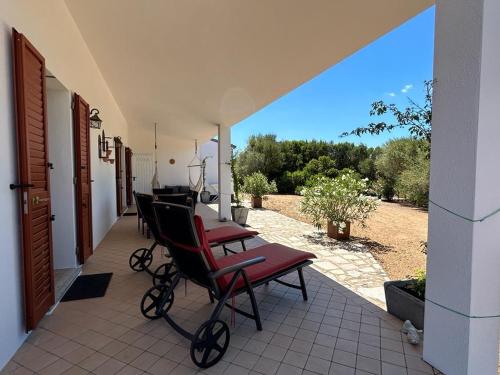 Balcony/terrace, LA PIANA Holiday House in Luogosanto