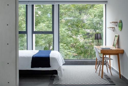 NIU Modern & Centric Lofts
