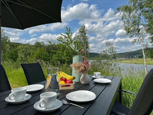 HOLIDAY VILLAGE "SEEBLICK" in Bavaria - tiny chalets with terrace right on the lake