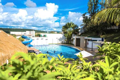 Úszómedence, Apartamento Enseada Nautico Caldas Novas - GO in Parque Termas de Caldas