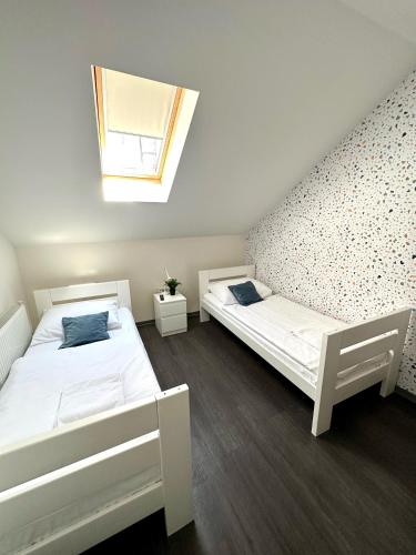 KAPTOL Rooms Room Type - Twin Room with Shared Bathroom
