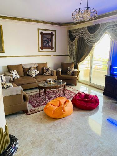 Lovely Villa 5- bedroom with Overflow Pool with Nice Garden at Green Oasis Resort in Bahig
