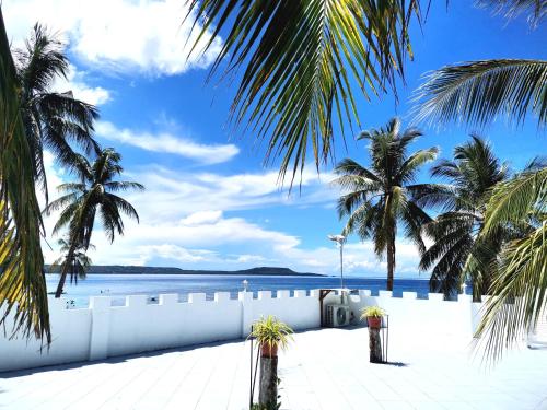 BEACH FRONT WHITE HOUSE VILLA in เกาะซีกีคอร์