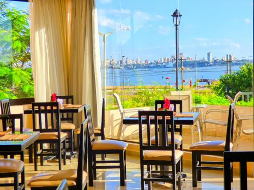 餐廳, De La Costa Hotel in 恩卡馬西昂