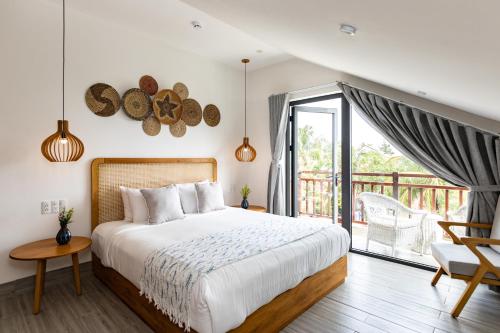 The Watermark Beachside Hotel, Хойан (фото 8)