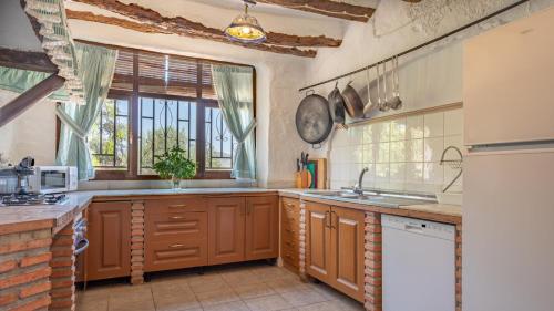 廚房, Cortijo Alzamigaja Archidona by Ruralidays in 阿切多納