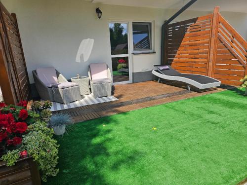 Viesnīcas āriene, Apartament 2B Niebieskie Apartamenty Poddąbie z basenem krytym, odkrytym, salą zabaw, animacjami (Apartament 2B Niebieskie Apartamenty Poddabie z basenem krytym, odkrytym, sala zabaw, animacjami) in Poddabie