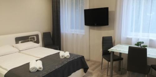 Napolá apartman (Napola apartman) in Balatonalmadi