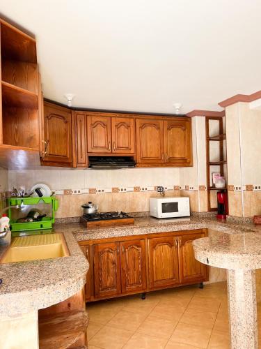 Kitchen, Maison d'hotes familiale "Dar Aboulanwar" in El Jadida