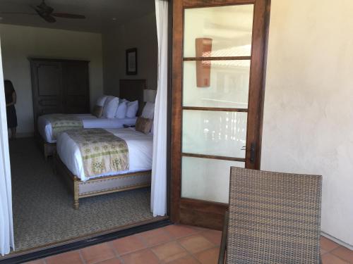 Book the Deluxe Queen Room with Two Deluxe Queen Room with Two Queen Beds