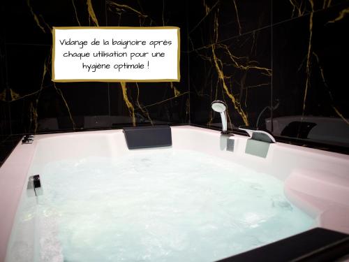 Le Moment Détente - Appartement avec balnéothérapie photo 3