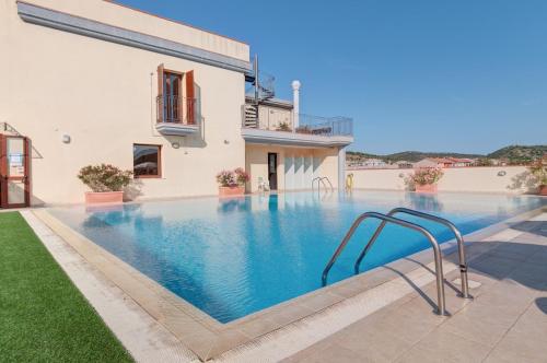 ISA-Residence with swimming-pool in Villasimius, apartments with air conditioning and private outdoor space