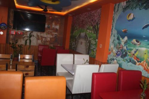 Restaurant, Hotel Giggle Coast Restro And Lodging in Birtamode