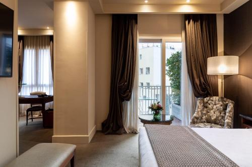 Suite The Wellington Club con terraza y vistas al patio