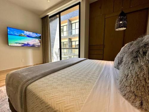 1BR Beautiful Condo -Rooftop Pool with Stunning View in Playa del Carmen, Mexico