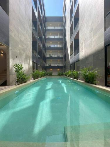 1BR Beautiful Condo -Rooftop Pool with Stunning View in Playa del Carmen, Mexico