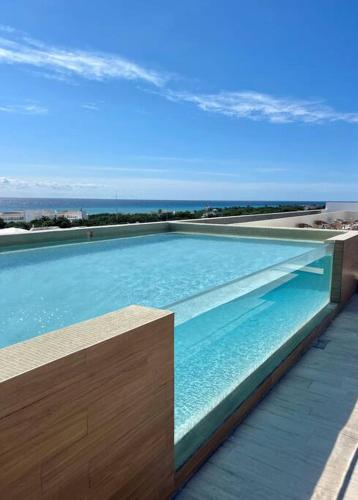 1BR Beautiful Condo -Rooftop Pool with Stunning View in Playa del Carmen, Mexico