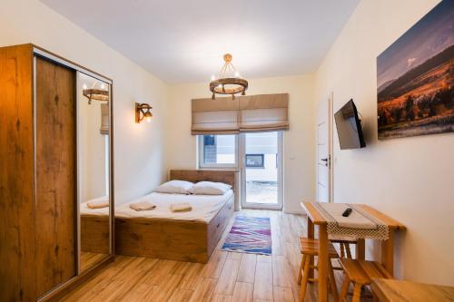 Apartamenty,pokoje Paholski