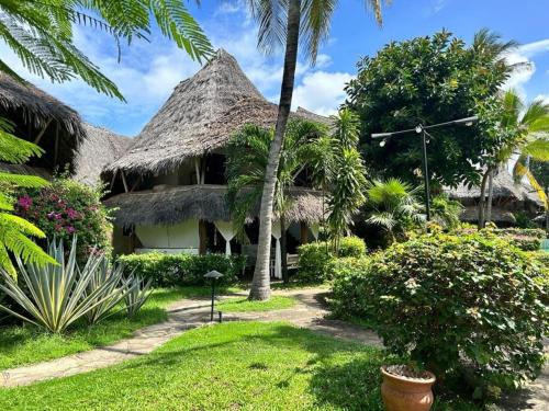 Gemütliches Ferienhaus am weißen Sandstrand