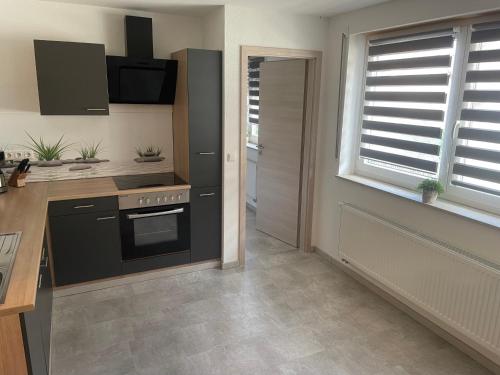 廚房, Ferienwohnung an der Linde in 比紹夫斯海姆a.d.力弘