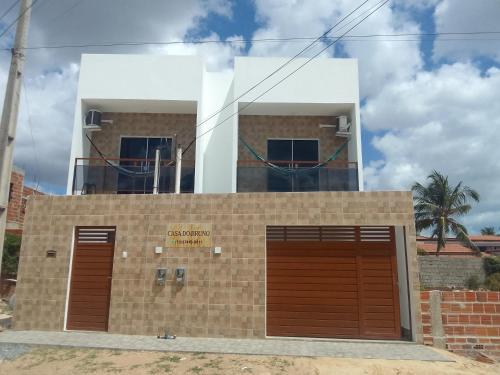 Casa do Bruno - Apartamento terreo - 1 - Terra - Quarto e sala com cozinha americana na praia do preá-CE