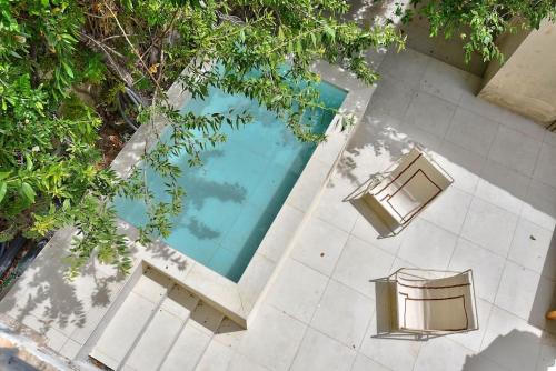 Apartment room in NOCNOC - Le Terrazzo - Petite piscine et jardin en ville