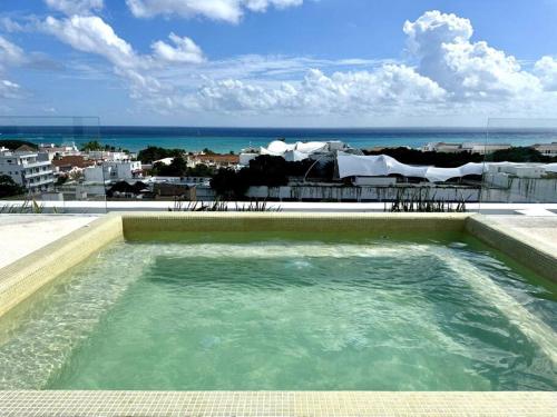 2BR Modern Condo with Rooftop Pool - Prime Location by Solmar Rentals in Playa del Carmen, Mexico