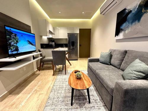 Modern Loft with Rooftop Pool & Steps from the Beach by Solmar Rentals in Playa del Carmen, Mexico